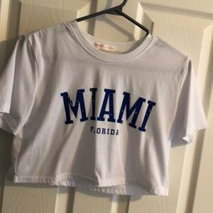 Miami blue and white cropped tee